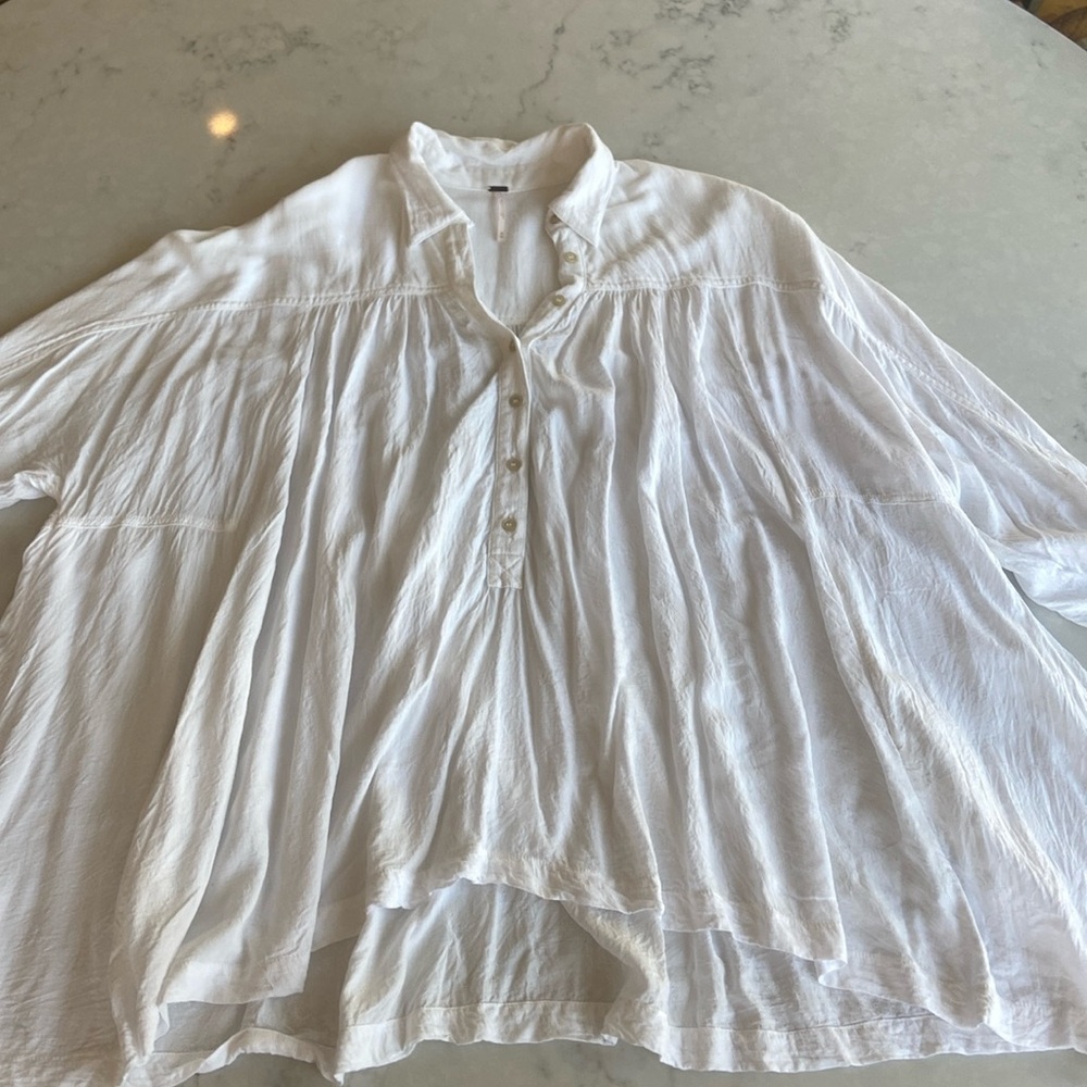 Free People white button down top with pockets.
